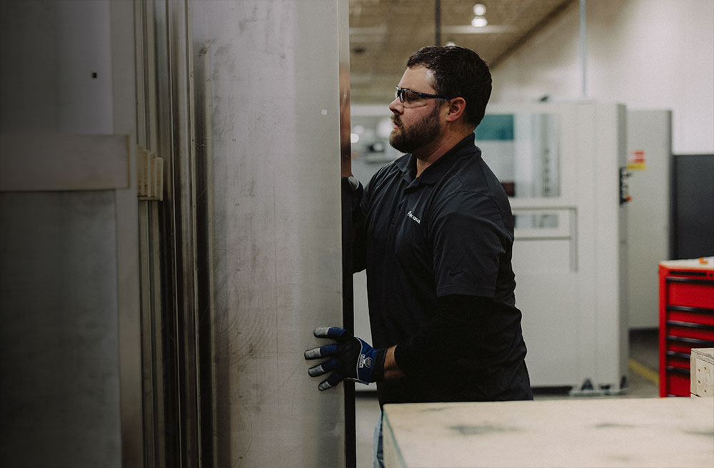 Jeremy programs our high-tech equipment, helping bring new ideas to reality.