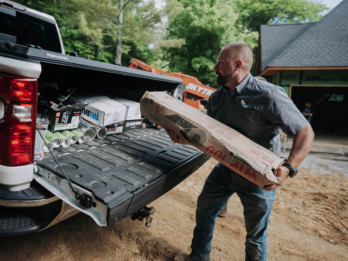 Chevrolet Silverado 2500HD work truck with a Tectonic tri-fold tonneau cover
