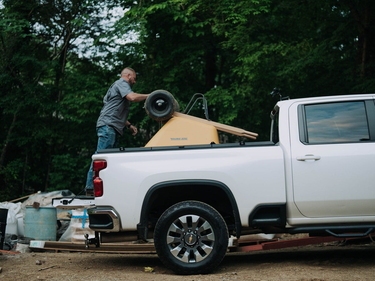 Chevrolet Silverado 2500HD work truck with a Tectonic tri-fold tonneau cover