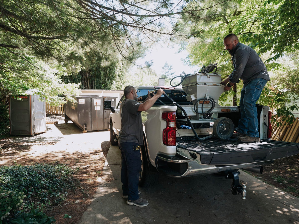 Chevrolet Silverado 2500HD work truck with a Tectonic tri-fold tonneau cover