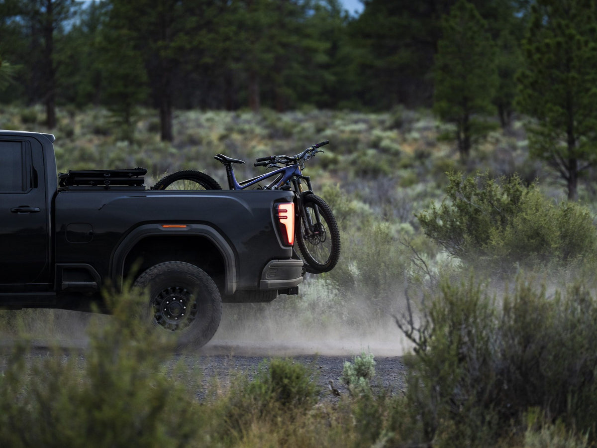 GMC Sierra HD with a Tectonic tri-fold tonneau cover at the lake