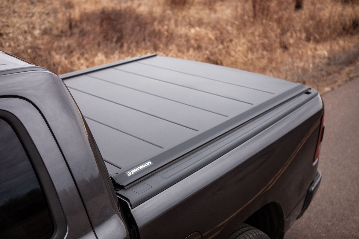 Ram 1500 TRX with a Tectonic tri-fold tonneau cover in the desert
