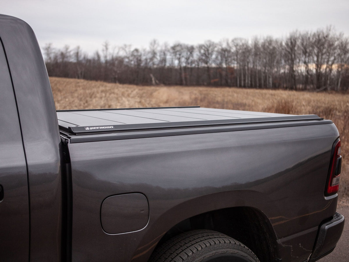 Ram 1500 TRX with a Tectonic tri-fold tonneau cover in the desert