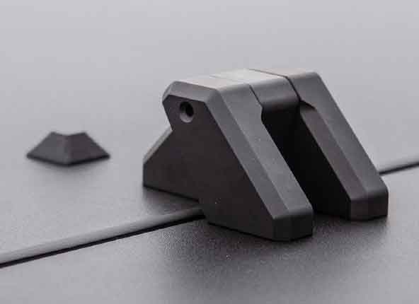 A closeup view of the primary cover hinge.