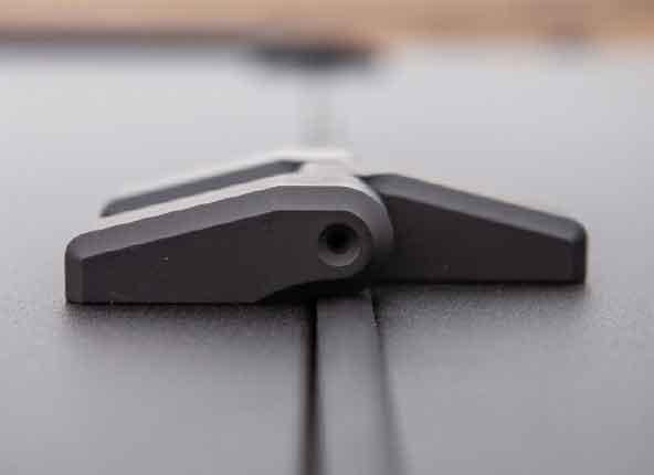 A closeup view of the secondary cover hinge.