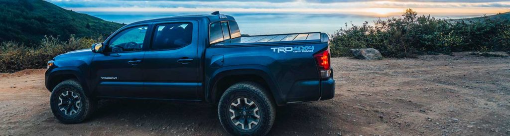 Toyota Tacoma with Peragon Bed Cover at Sunset